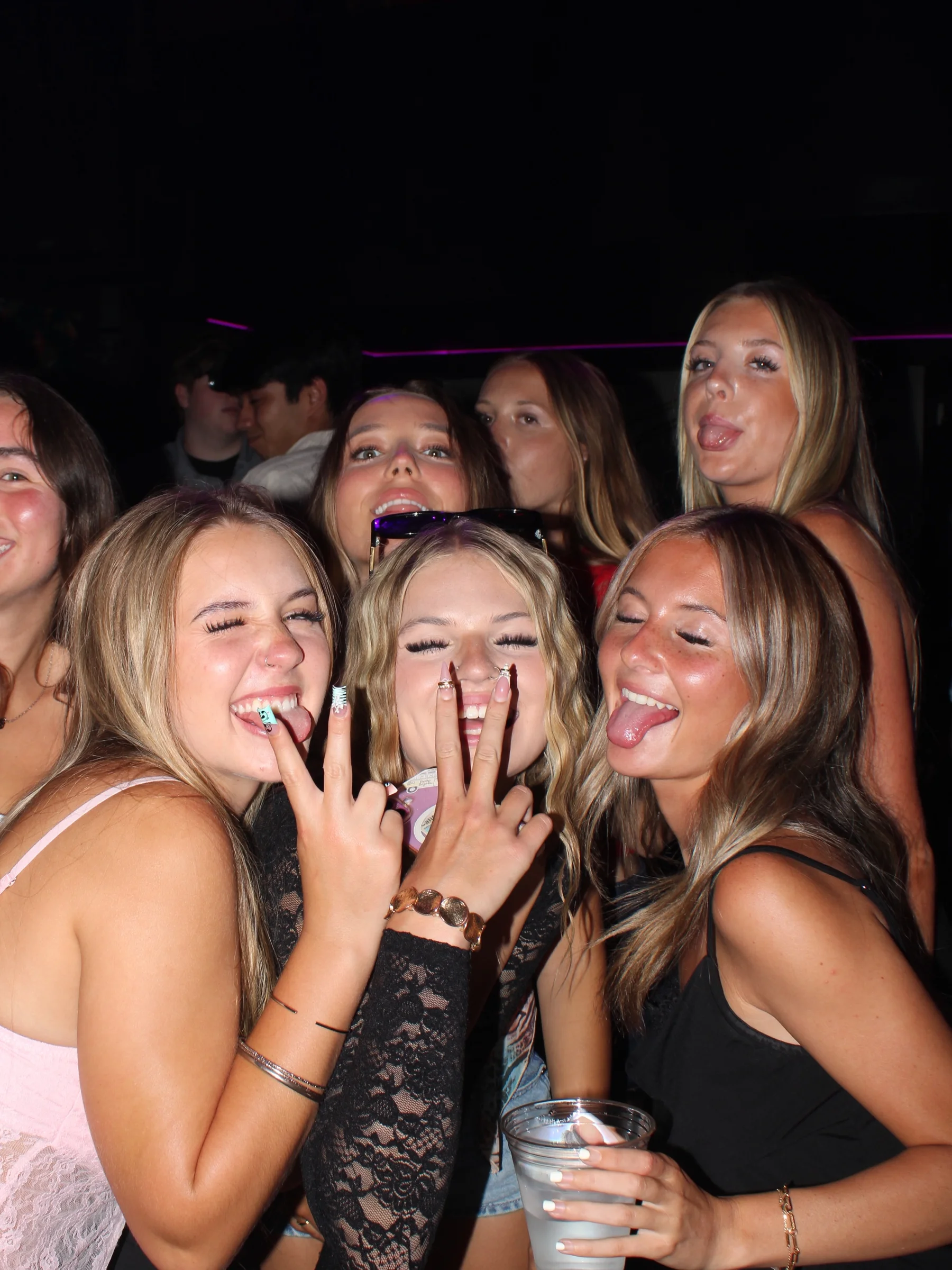 Friends celebrating at RUSH’s Midnight in Monaco event